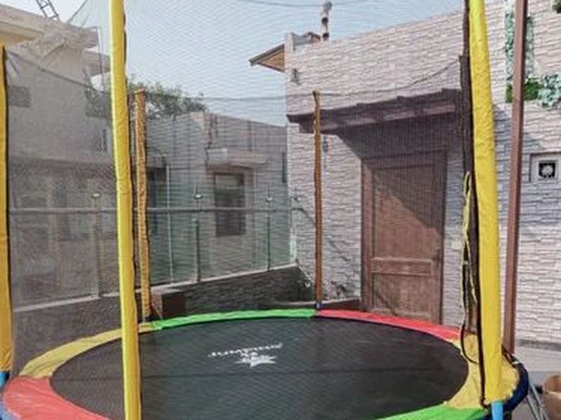 Kids' rental — outdoor trampoline with a safety net — Arya Events Planner, Kharghar, Navi Mumbai