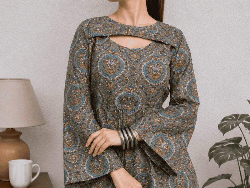 Women's printed kurti with bell sleeves — a contemporary-ethnic top styled with denim. — Vastradrobe, Golf Course Road, Gurgaon
