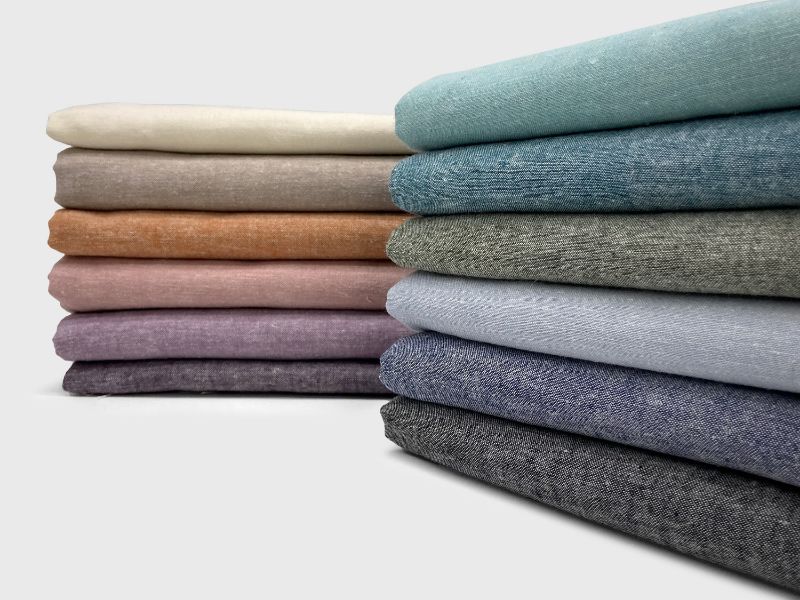 Vastradrobe co-ord sets folded across the season's colourway run — a look at the in-house fabric range. — Vastradrobe, Golf Course Road, Gurgaon