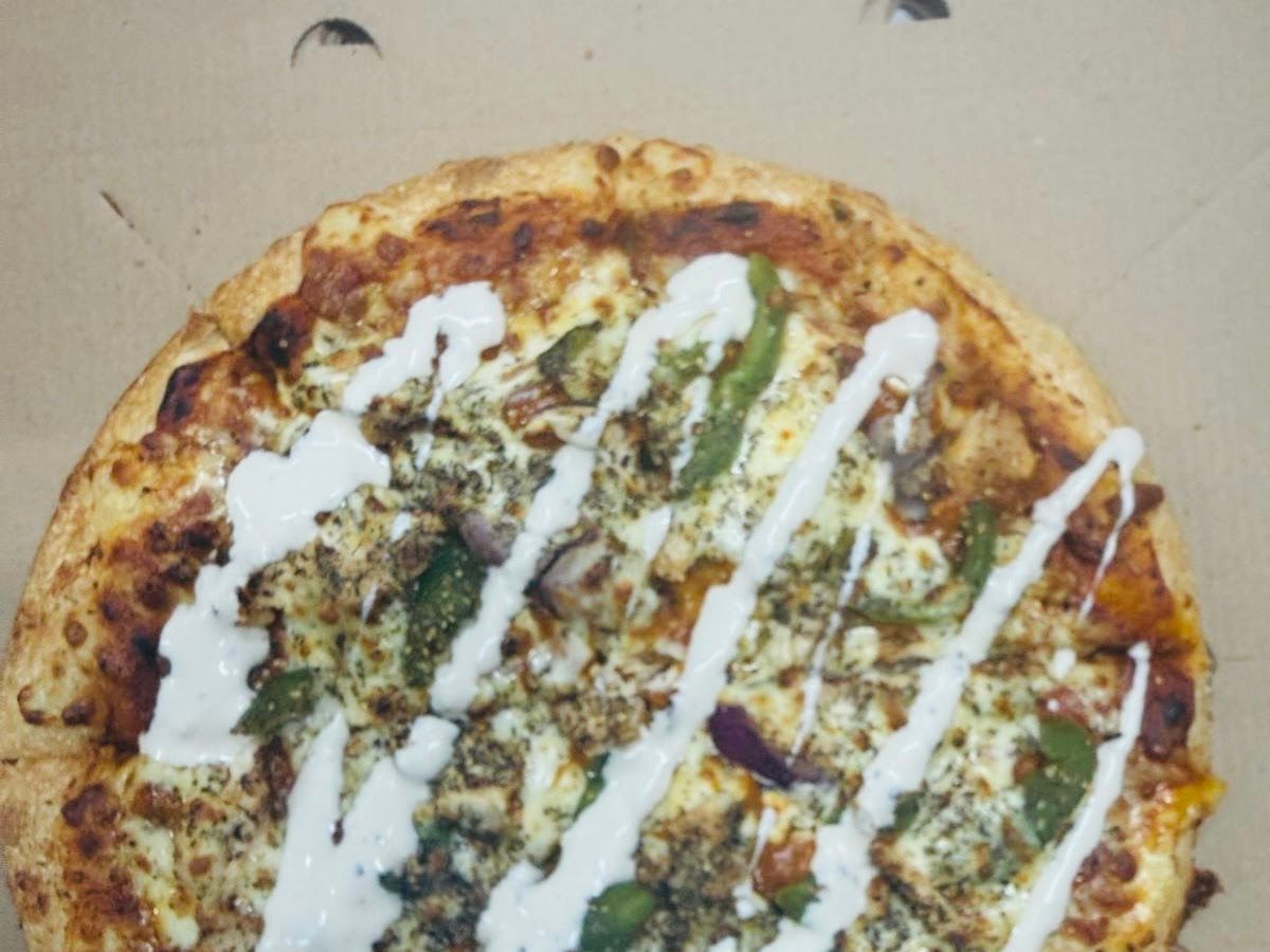Gallery — PIZZA MAGIC Hawera (New Butter Chicken Pizza), Hawera