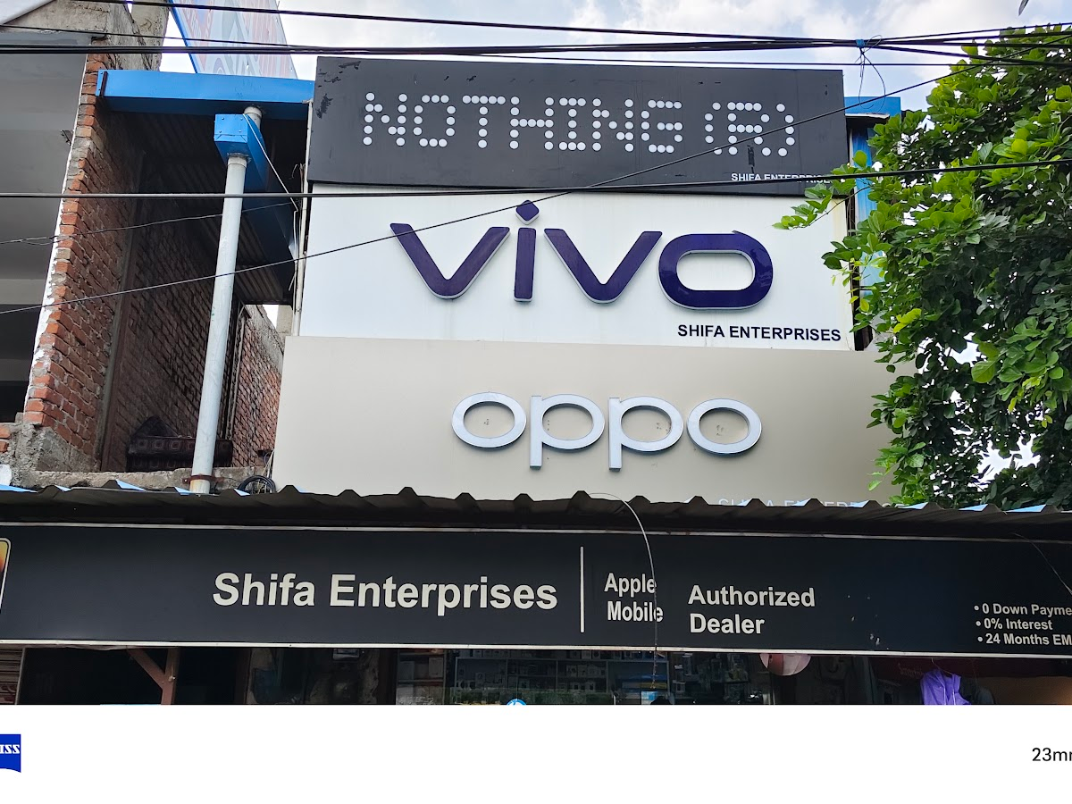 Exterior of Shifa Enterprises mobile phone shop on P.A.C Rd, Sadullahpur, Kanpur