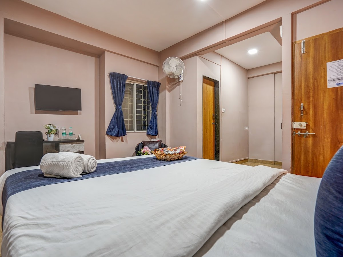 Suite room with 42-inch OTT TV at SV Hospitality, Pune