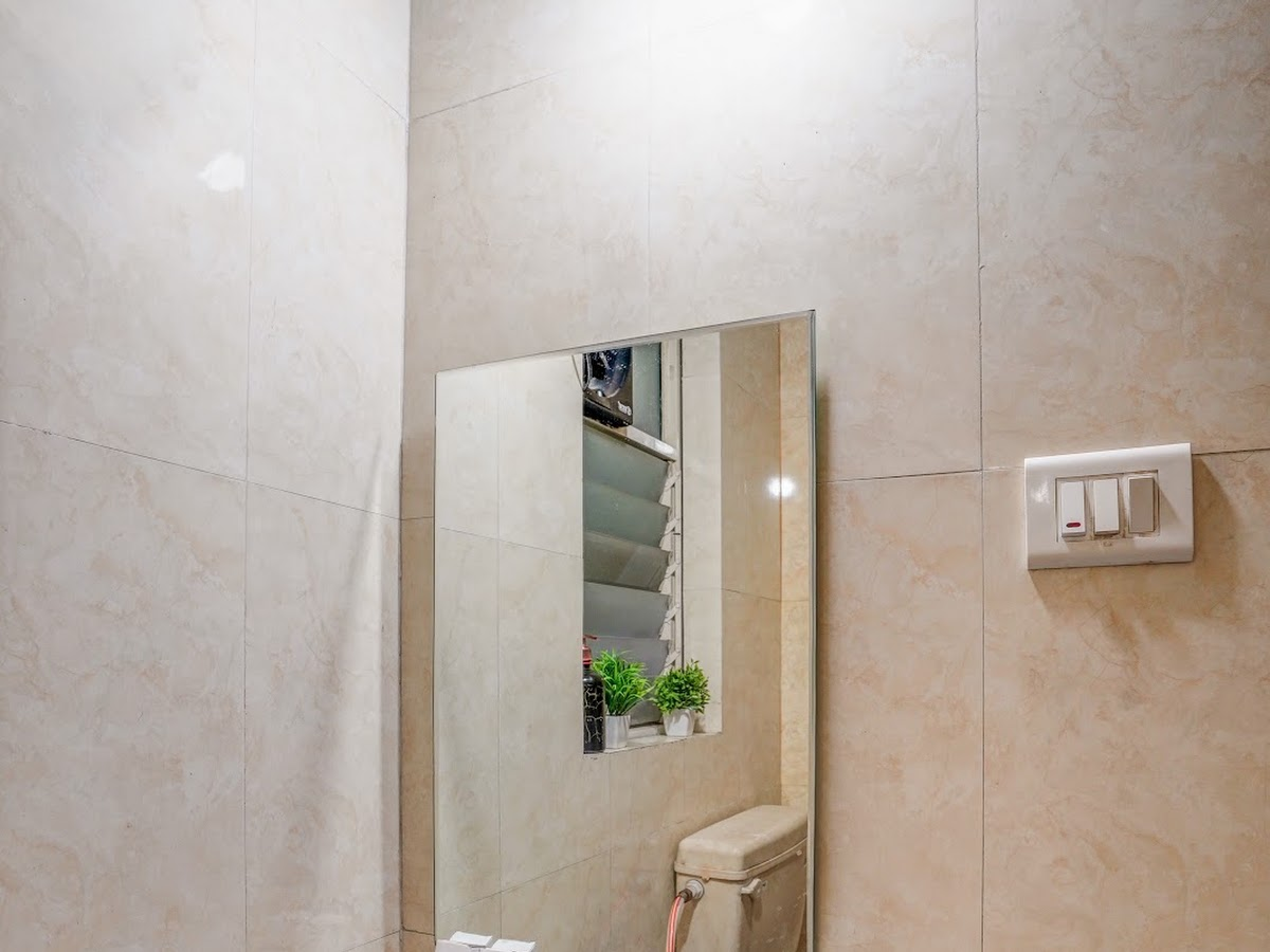 Neat bathroom in a room at SV Hospitality, Pune