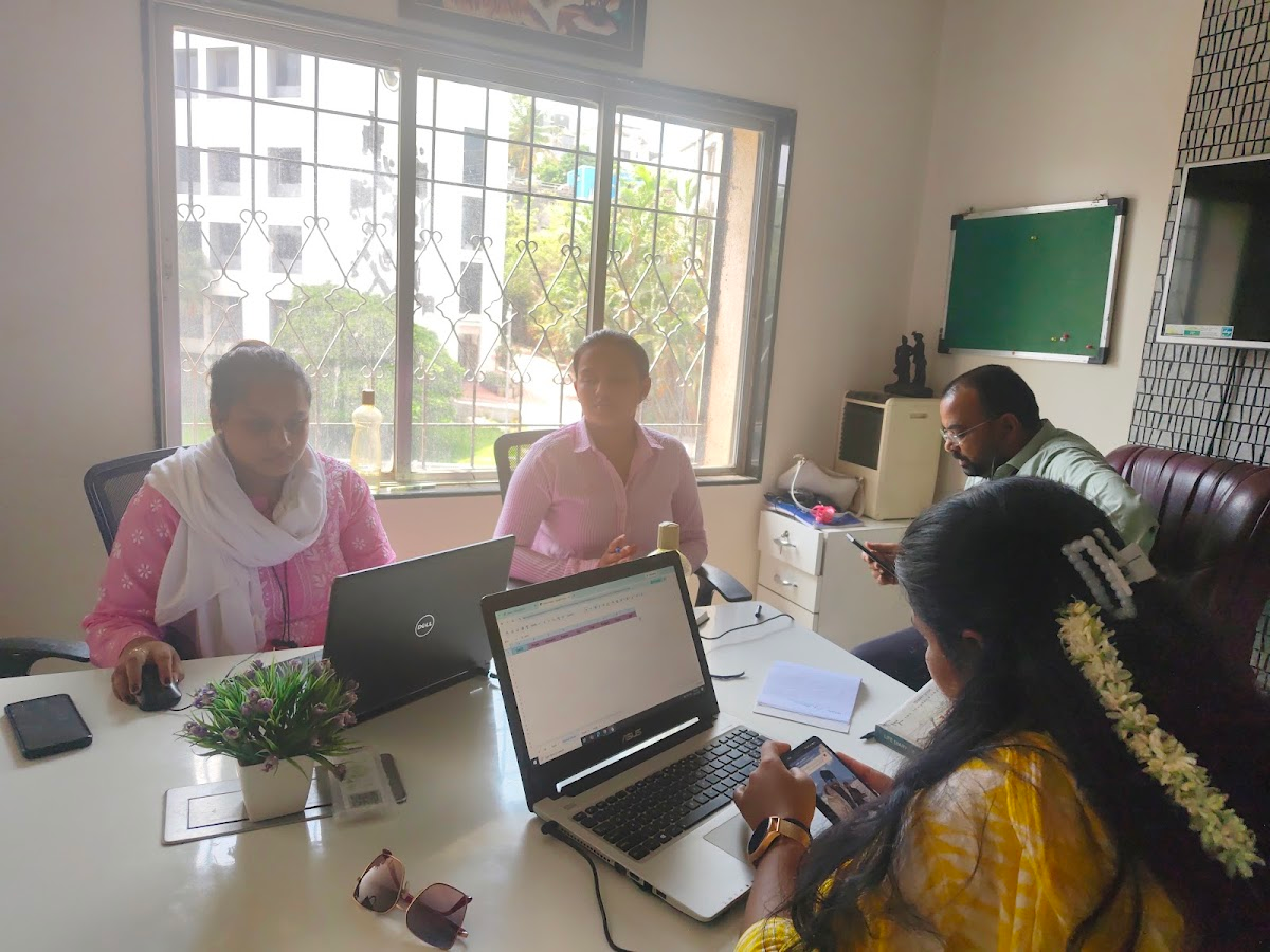 Consultation desk at S S Associates tax firm, Dhayari