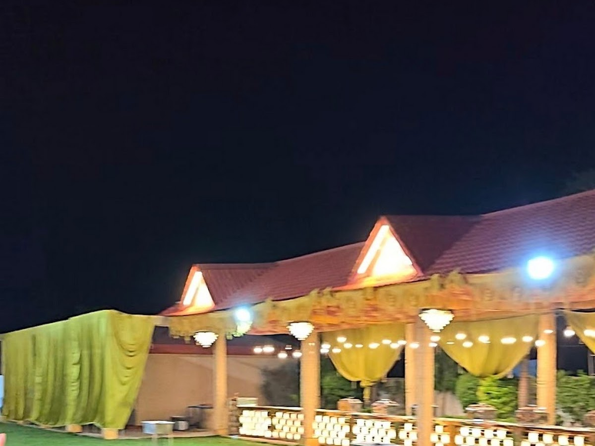 Lush green lawns at Shree Bhardwaj Garden & Resort wedding venue in Rewa