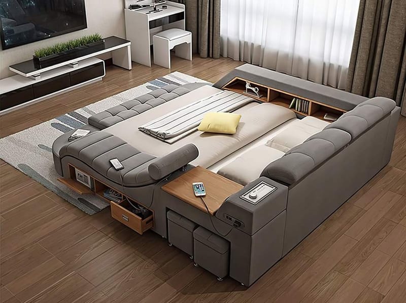 Gray sectional sofa with built-in storage and reclining seats in a living room